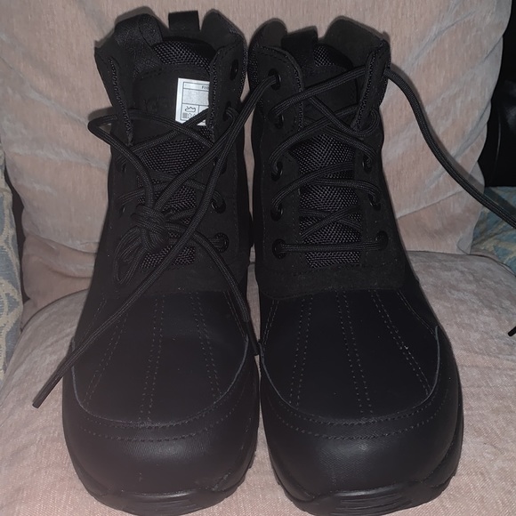 Black UGG for men size 9.
